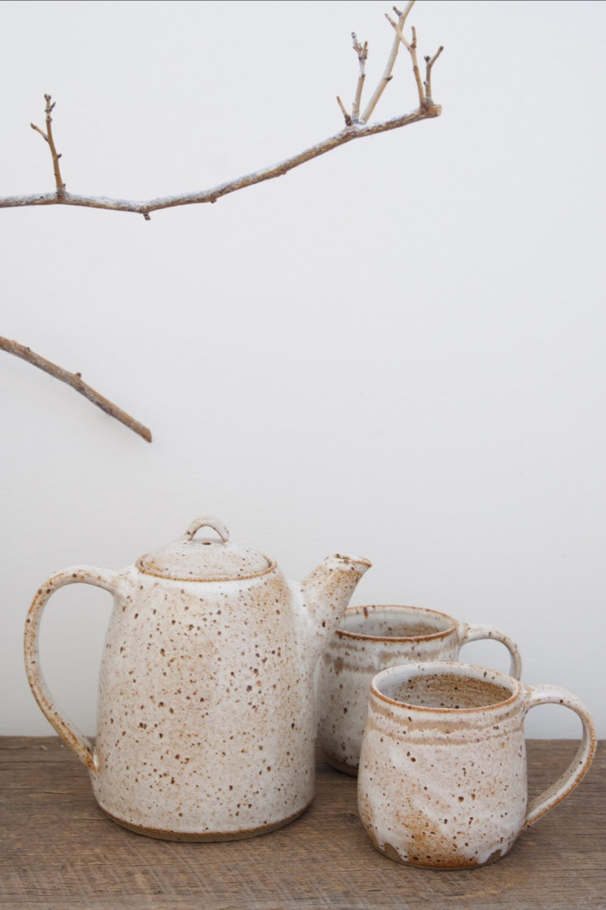 Upright speckled teapot