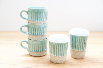 Ocean shore carved go cup