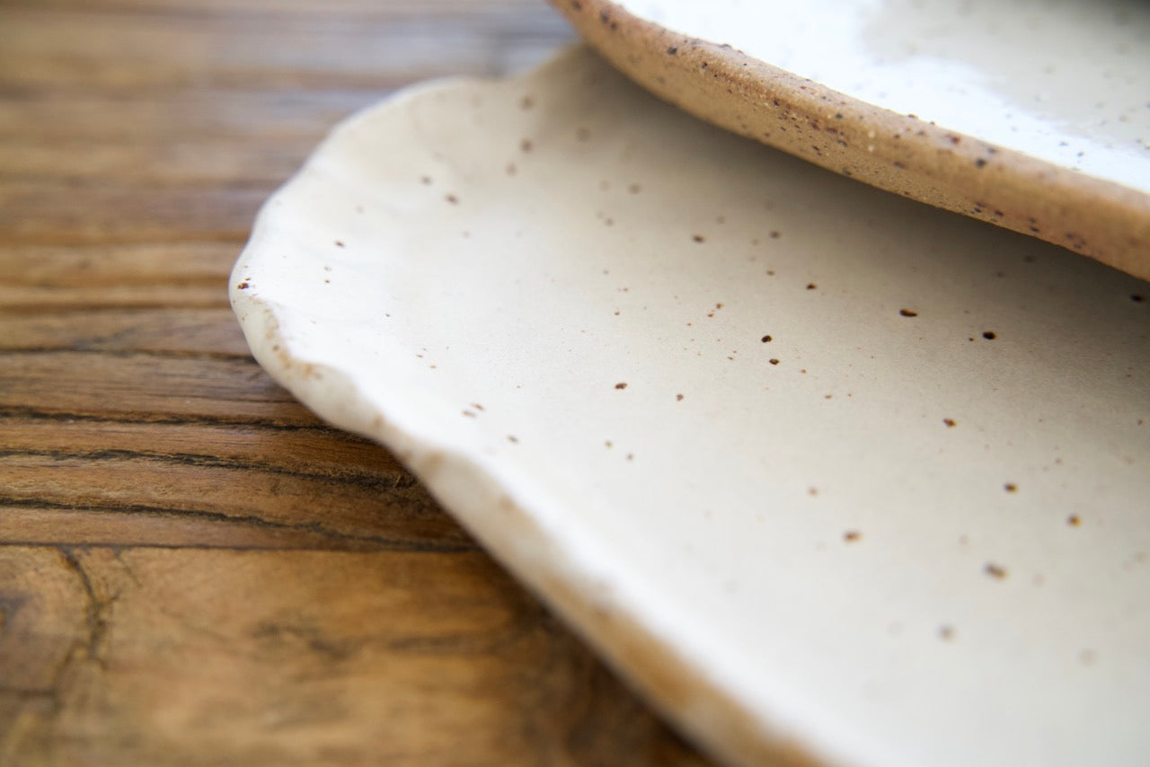 Oval platter with curly handles