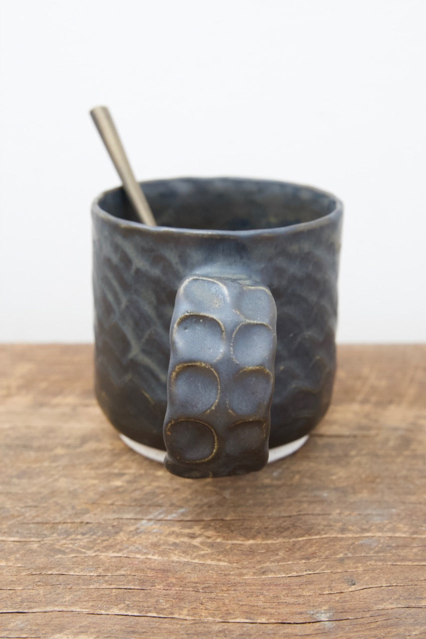 Black dinosaur mugs