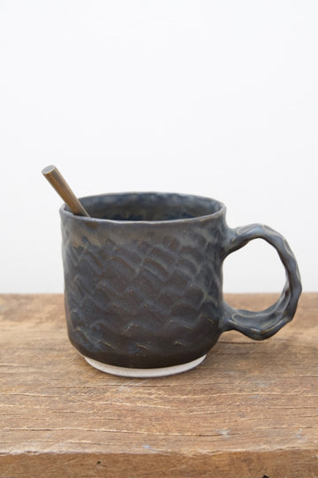 Black dinosaur mugs