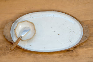 Oval platter with curly handles