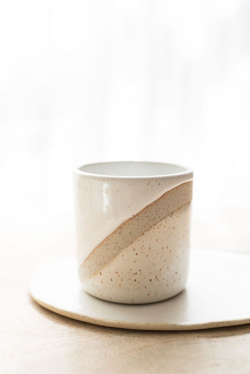 Gaura handle-less mug in two tone