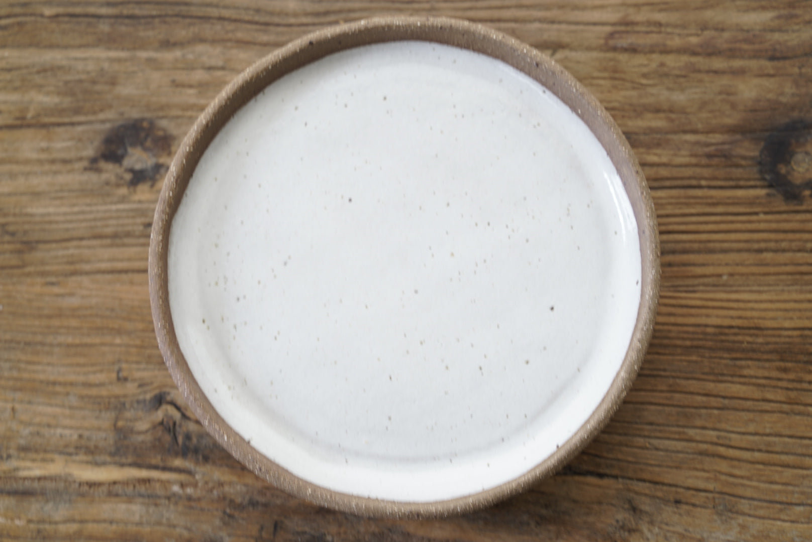 Rustic high rimmed dinner plate